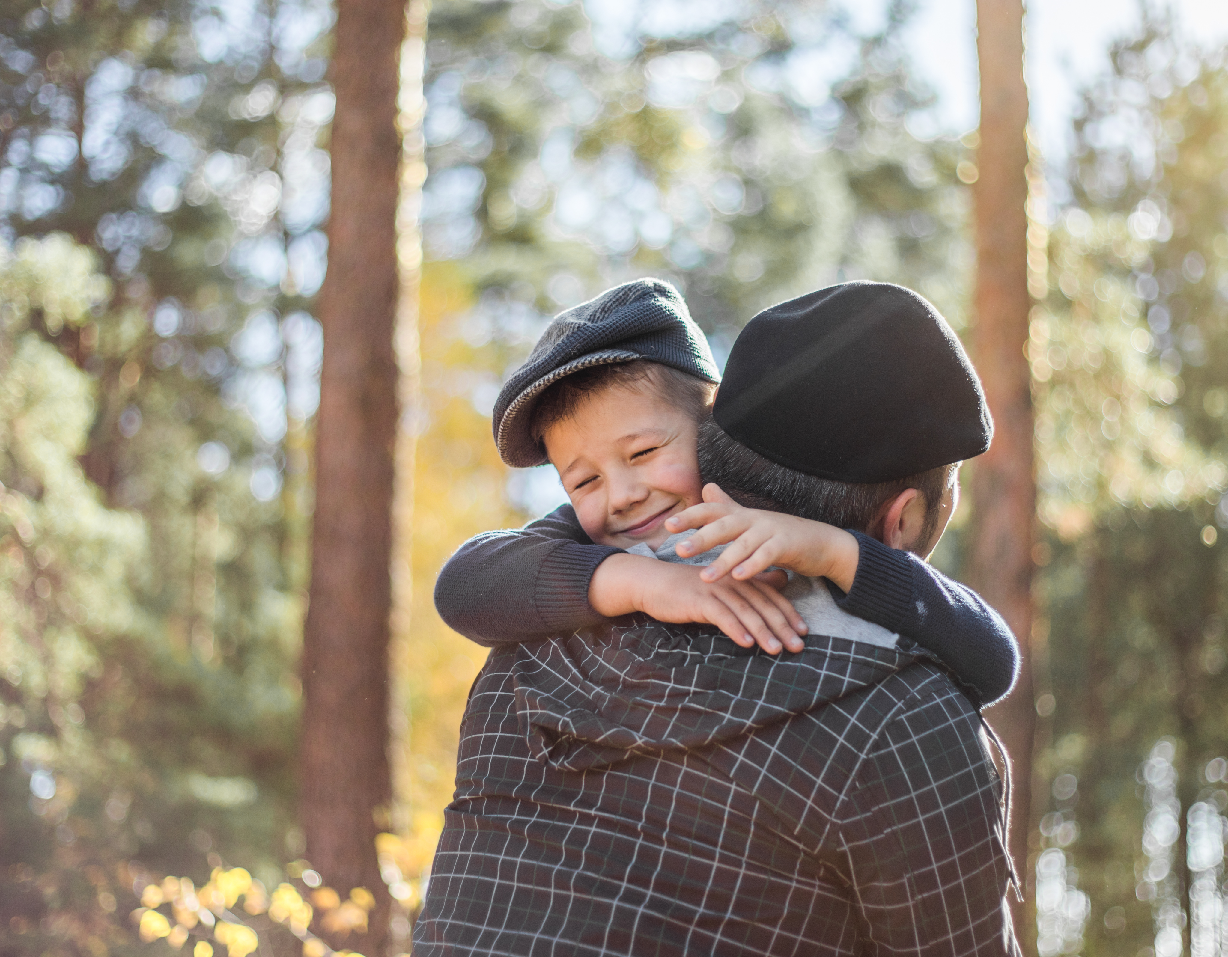 Child hugging parent